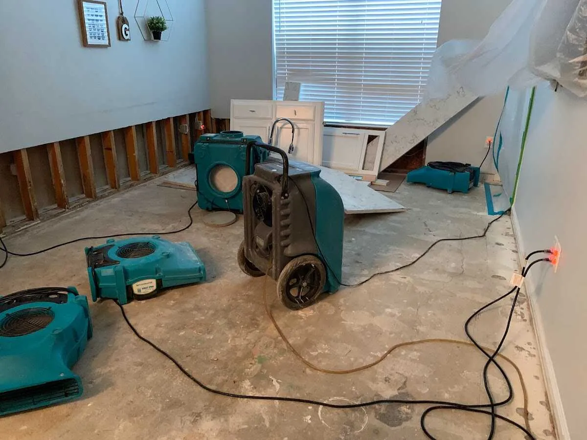 Dehumidifier in flood-cut room for Water Damage Restoration in Camillus